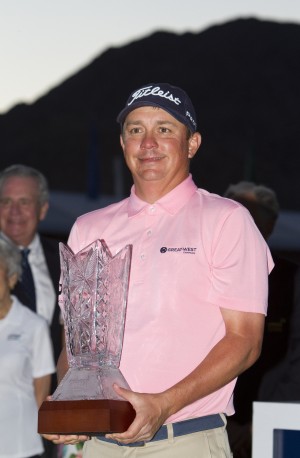 Dufner hoisting the Bob Hope Memorial Trophy, awarded each year to the CareerBuilder Challenge champion. Photo credit to “CareerBuilder Challenge in partnership with the Clinton Foundation.”